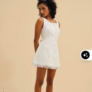 Elegant White Lace-Trimmed Dress